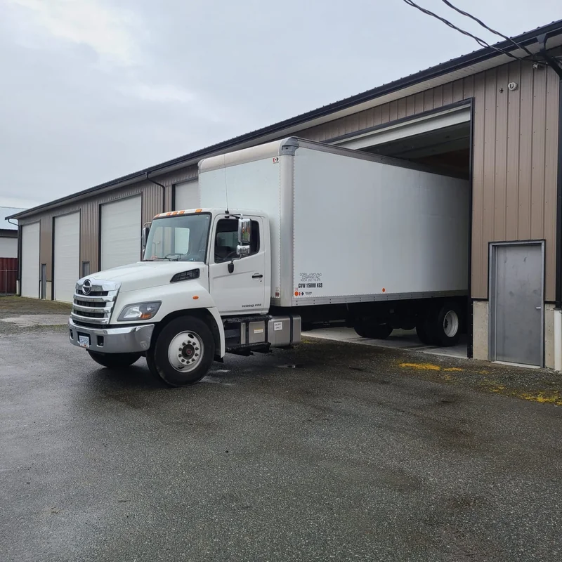 Gorilla Moves packing crew carefully handling a specialty item during a Fraser Valley move